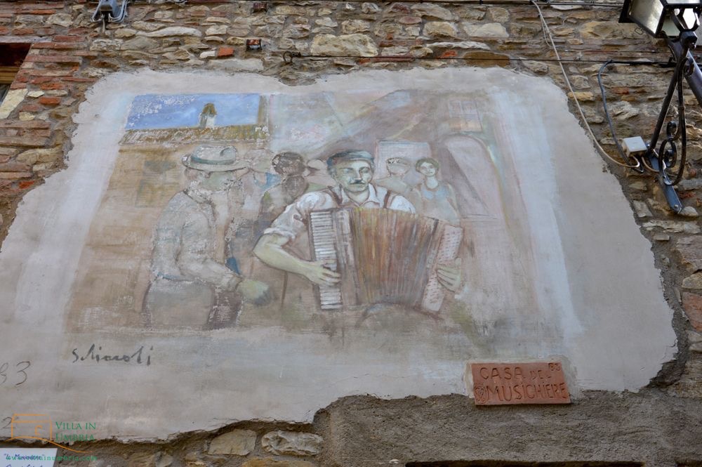 Straatmuzikant, Mugnano, muurschildering
